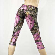 "SXYFITNESS Yoga Pants are available in a capri or legging style. The Hot Yoga Pants are available in two fit options : Low Rise, or High Waist/ Fold Over. These Printed Leggins are functional, with a great fit! Bend and stretch in style FABRIC: High Quality Performance Knit, breathable, 4 way stretch, medium weight lycra. STYLE: Low Rise * XXS/XS: (00-0 US) 8\" rise, 21\" inseam capri, legging 29\" inseam * XS/S: (0-2 US) 8.5\" rise, 21\" inseam, legging 29\" inseam * S/M: (4-6 US) 9.5 \" rise, Fitted Camouflage Bottoms For Outdoor, Pink Stretch Activewear For Outdoor, Fitted Camouflage Workout Bottoms, Pink Stretch Bottoms For Outdoor, Camouflage Athleisure Bottoms For Gym, Fitted Camouflage Leggings For Sports, Fitted Moisture-wicking Workout Capris, Fitted Capri Length Yoga Pants For Sports, Fitted Moisture-wicking Capris For Workout