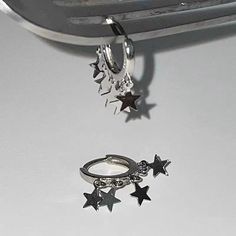 𝔇𝔢𝔱𝔞𝔦𝔩𝔰: Style: Grunge, Harajuku, Alt Material: Zinc Alloy & Metal Quantity: 1 pair Highlights: This is a pair of grunge-style ear hoop earrings featuring star-shaped pendants. They are cute and special, perfectly matching your grunge or dark wardrobe. The design is very unique and will be the ideal addition to your collection. Enjoy free shipping with a purchase of over 80$ Grunge Harajuku, Dark Wardrobe, Twinkle Star, Grunge Style, Trendy Jewelry, Star Pendant, Grunge Fashion, Star Shape, Stylish Accessories