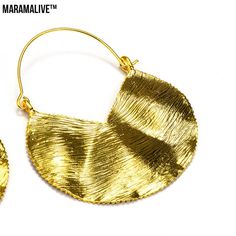 Let your fashion speak for itself with these gorgeous Fashion Retro Female Ornament Earrings Alloy Exaggerated by Maramalive™! These light-weight earrings are crafted from metal alloy and feature an exaggerated shape with a minimalist design, making them the perfect statement piece to complete any outfit. You will love the crystal accents that dance in the light and lend to the elegant beauty of these stunning earrings.These shimmering earrings make the perfect gift for the special woman in your Handmade Alloy Earrings For Party, Single Hoop Earring In Alloy For Parties, Brass Pierced Hoop Earrings For Party, Nickel-free Gold-plated Hoop Earrings For Party, Handmade Gold Alloy Earrings, Bohemian Metal Hoop Earrings For Party, Bohemian Brass Hoop Earrings For Party, Nickel-free Brass Hoop Earrings For Party, Nickel Free Brass Hoop Earrings For Party