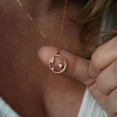 Our round stars necklace is delicate and chic. Made with cubic zirconia and 14k gold fill. #starnecklace #goldnecklace #galaxyjewelry #celestial #bohojewelry #daintyjewelry #wanderandlustjewelry Luxury Minimalist Jewelry With Star Charm, Luxury Star-shaped Necklace As Gift, Luxury Star-shaped Necklace For Gift, Luxury Star Charm Necklace For Gift, Luxury Rose Gold Necklace With Star Charm, Luxury Celestial Round Necklaces, Luxury Celestial Wedding Necklaces, Luxury Celestial Necklaces As A Gift, Luxury Star Charm Necklace Gift