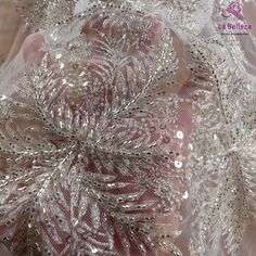 Price: The price is for 1 yard. if you buy more than 1 yard ,it won't be cut. will come in one piece the longest is 20 yards. Material: polyester,sequins,beads Fixed Wide : 130cm or 51 inches. color:Silver Want to see other colors and more similar Beading lace fabrics come to: https://www.etsy.com/shop/Randyfabrics?ref=hdr_shop_menu&section_id=14192305 Shipping: Choose the shipping way you need, if you want package shipped by express,please note the phone number on order. Use for Dress,cloth Elegant Silver Lace Tulle Fabric, Elegant Silver Sequin Fabric With Pearl Embroidery, Embellished Silver Lace Tulle Fabric, Silver Embellished Lace Tulle Fabric, Silver Lace Sequin Fabric With Rhinestones, Silver Sequin Fabric With Lace For Party, Silver Lace Sequin Fabric In Glamorous Style, Silver Sequin Fabric With Lace Work For Party, Silver Glamorous Lace Sequin Fabric