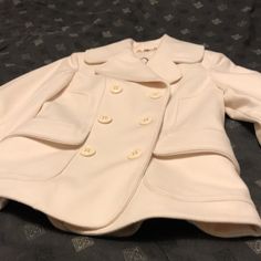 Guess Brand Pea Coat. Size Small. Super Cute, Warm And Cozy. Jacket Brand New. Never Worn W/ Tags. Has A Light Spot On Back Of Outer Neck Collar And Some Faint Markings On Left Lower Back - See Photos. Depends On Room Lighting If Visible Or Not. Spring Lapel Collar Fitted Pea Coat, Spring Fitted Pea Coat With Lapel Collar, Chic Formal Spring Pea Coat, Chic Cream Pea Coat With Button Closure, Fitted Double-breasted Spring Pea Coat, Elegant White Double-breasted Pea Coat, Winter White Pea Coat For Spring Workwear, Fitted Beige Pea Coat For Work, Classic Cream Pea Coat With Long Sleeves