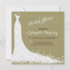 the bridal shower card features an elegant gown on it's back, with white flowers in the foreground