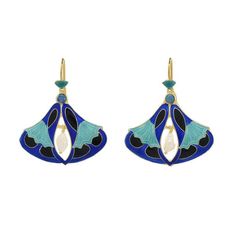 These earrings are treasures that seduce the eyes. A double trumpet flower is brilliantly colored in turquoise and royal blue enamel work and accented with an pearl and turquoise stone. Hoop backs for pierced ears. 24k gold over sterling silver. Size 1 1/4 inches. Blue Enamel Dangle Jewelry, Enamel Ear Wire Jewelry, Blue French Hook Jewelry As Gift, Elegant Turquoise Enamel Earrings, Art Deco Blue Drop Earrings, Blue Art Deco Drop Earrings, Elegant Blue Enamel Jewelry, Blue Enamel Jewelry With Matching Earrings, Turquoise Enamel Dangle Earrings