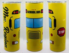 three yellow school bus tumblers sitting next to each other