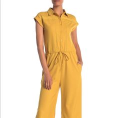 Nwt One One Six Short Sleeve Front Button Jumpsuit In Mustard Size Small ***The Drawstring Is Missing And There Is A Snag On The Bottom Right Pant Leg*** A Lace Knit Trim, Solid Exterior, And Short Sleeves Completes This Jumpsuit. - Pointed Collar - Partial Front Button Closure - Short Sleeves - Drawstring Waist - 2 Side Pockets - Lace Knit Trim - Solid - Approx. 55" Length, 28" Inseam (Size S) Fiber Content 97% Polyester, 3% Spandex Casual Yellow Jumpsuits And Rompers For Work, Yellow Jumpsuits And Rompers For Spring Workwear, Spring Yellow Jumpsuits And Rompers For Workwear, Yellow Jumpsuit For Spring Workwear, Fitted Orange Jumpsuits And Rompers For Work, Fitted Orange Jumpsuits For Work, Orange Jumpsuits And Rompers For Work, Black Lace Jumpsuit, Black Strapless Jumpsuit