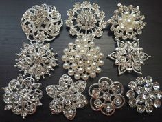 10 pcs Rhinestone Buttons Brooches Assortment Large Embellishment Set Pearl Crystal Wedding Brooch Bouquet US Seller BT165 by SevenSpringSupply on Etsy https://www.etsy.com/listing/223069338/10-pcs-rhinestone-buttons-brooches Button Brooch, Bouquet Cake, Crystal Garland, Wedding Headpieces, Hair Comb Clips, Wedding Brooch Bouquets, Columbus Day, Crystal Buttons, Brooch Bouquet