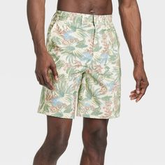 Transition between land and sea in charming tropical style with these Floral Print Hybrid Swim Shorts from Goodfellow & Co™. These hybrid swim shorts made from 4-way stretch, wrinkle-resistant fabric offer comfortable wear in or out of water. A fly button and zipper along with belt loops offer a secure fit, while the side and back pockets come in handy for stashing small essentials. Plus, the UPF 50+ rated material helps keep you protected from the sun. Pair them with your regular tees and sneak Swim Tank, Land And Sea, Tropical Style, Designer Swimwear, Swim Suit Bottoms, Swimwear Fashion, High Waisted Shorts, Swim Shorts, Upf 50