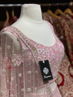 Bubblegum pink intricate with fully sequence, studs motifs thread embroidery and crystal stone flared lehenga embellished with pearl design.Styled with a matching blouse and net dupatta. Bubblegum pink gorgeousness is undoubtedly enchanting ensemble to style your wedding look. Fabric: Net Custom designed according to client measurements and color preference. Production and delivery time is 120 days! Pink Kundan Choli For Wedding, Pink Kundan Traditional Wear For Wedding, Party Wear Lehenga With Pearl Embroidery, Pink Anarkali Set With Intricate Embroidery For Reception, Party Wear Lehenga With Pearl Embroidery For Reception, Pink Kundan Anarkali Set For Designer Wear, Pink Kundan Wedding Set, Pink Kundan Traditional Wear For Reception, Party Wear Festive Lehenga With Pearl Embroidery