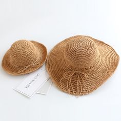 This Mommy & Me Matching Woven Hat set brings a sense of style and togetherness for moms and their little ones. This charming hat set is not only fashionable but also offers practical benefits, making it a must-have for any parent-child duo. The set is designed for both style and functionality. It provides protection from the sun's rays, keeping you and your child shielded from harmful UV radiation. The wide brim offers shade for your face and neck, reducing the risk of sunburn. These hats are m Woven Hat, Summer Straw Hat, Straw Hat Beach, Hat Size Chart, Holiday Hats, Sun Protection Hat, Flat Lay Photography, Straw Hats, Boys Fashion