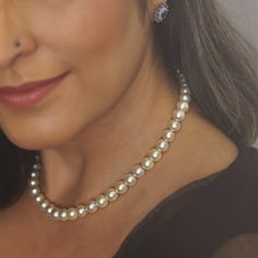 Inspired by the iconic pearl necklace made famous by Jackie Kennedy, the Emily Pearl necklace is an elegant and sophisticated line of beautiful South Sea pearls with a diamond-studded closure that has an Emerald at its heart and Tahitian pearls on either side. Attached to it are a chain and a South Sea pearl drop. Classic Single Strand Diamond White Jewelry, Classic Jewelry With Diamond Cut Round Beads, Classic High Luster Necklaces For Anniversary, Classic Cubic Zirconia Pearl Necklace For Formal Occasions, Brilliant Cut Pearl Necklace For Anniversary, Anniversary Pearl Necklace With Brilliant Cut, Anniversary Brilliant Cut Pearl Necklace, Classic Pearl Necklace With Cubic Zirconia, Classic Round Brilliant Cut Pearl Necklace