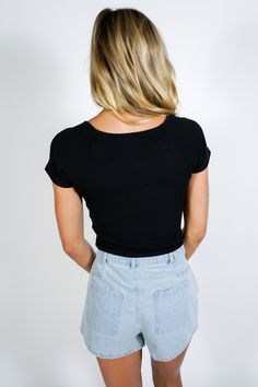 The Kallen Rib Top is the most perfect basic ribbed tee! It comes in both black and white and is cropped for a stylish twist. Double layered for comfort. No more boring basics! Size + Fit Riley is 5’7” and wearing a size Small Taylor is 5'2" and wearing a size Small Content + Care 95% Rayon 5% Spandex Machine Wash Cold with Like Colors Versatile Short Sleeve Crop Top, Versatile Fitted Crop Top With Short Sleeves, Versatile Black Fitted Crop Top, Black Fitted Versatile Crop Top, Versatile Black Crew Neck Crop Top, Black Fitted Crop Top Casual Style, Trendy Ribbed Crop Top For Layering, Fitted Black Cropped T-shirt For Spring, Basic Cropped Top For Layering