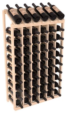 a wooden wine rack filled with lots of bottles on top of eachother in front of a white background