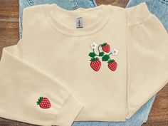 Introducing our Strawberry Embroidered Sweatshirt 2D Crewneck Sweatshirt For Family, the perfect blend of style, comfort, and family bonding! With its intricate embroidery and cozy fabric, this sweatshirt is designed to bring joy and warmth to every family member. Our sweatshirt features a vibrant strawberry design meticulously embroidered on the front, adding a playful and cheerful touch to your ensemble. The attention to detail in the embroidery brings the strawberries to life, creating a visu Embroidered Halloween, Women Sweatshirt, Sweatshirt For Women, Personalized Embroidery, Sweatshirt For Men, Custom Sweatshirts, Embroidered Sweatshirt, Halloween Sweatshirt, 3d T Shirts