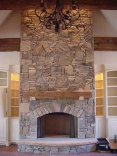 an image of a stone fireplace in a living room