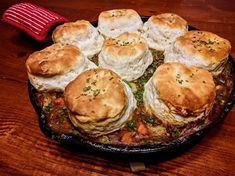 some biscuits and other food on top of a pan