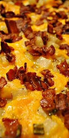 a casserole dish with bacon and cheese on it