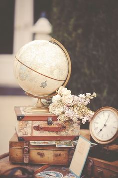 there is a globe and some books on top of each other with the words translation today in arabic