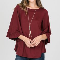 -Super Soft Chic Bell Sleeve Top With Ruffle Hem, Chic Tops With Ruffle Hem And Bell Sleeves, Red Ruffled Feminine Tops, Red Feminine Ruffle Top, Red Feminine Ruffled Tops, Fall Bell Sleeve Tops With Ruffle Hem, Fall Tops With Ruffle Hem And Bell Sleeves, Feminine Red Ruffled Tops, Red Blouse For Fall Layering