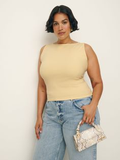 Bye sleeves.  Shop the Dusk Knit Top ES from Reformation, a sleeveless, fitted top with a boat neckline. Beige Relaxed Fit Knit Top, Cristina Top Reformation, Fitted Sleeveless Beige Knit Top, Reformation Tops, Reformation Dusk Knit Top, Swimwear Dress, Boat Neckline, New Tops, Outerwear Sweater