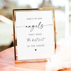 there's to our angels they have the best in the house sign on a table