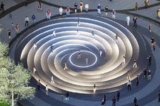 an aerial view of people walking around a circular object