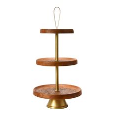 three tiered wooden cake stand with gold accents