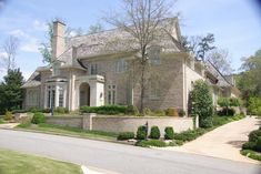 A limestone entry accompanied by dignified exterior elements announces this French Manor. The inviting foyer leads past the Dining Room, which opens onto the front terrace, to the Stair Hall and Living Room with a fireplace. The generously proportioned Kitchen allows plenty of space for a large island and full size pantry. The Keeping Room, with its fireplace, is adjacent to the Breakfast Room, which leads to the rear stair. The Master Suite sits privately beyond the Stair Hall with personal acc Low Country Cottage, Living Room With A Fireplace, French Manor, Bedroom With Bath, Hall And Living Room, Wine Tasting Room