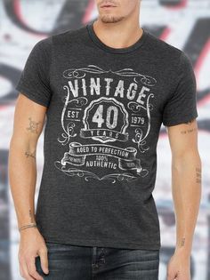 a man wearing a vintage 40 years t - shirt