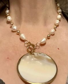 This is an 18 inch Pearl and Gold Chain with a 2.5 x 2.5 beautiful Large Mother of Pearl Medallion with the gold.   Great for that Summertime Glam! White Chain Necklace With Lobster Clasp, White Round Chain Necklace With Lobster Clasp, White Necklace With Gold Chain, White Round Necklace With Gold Chain, Gold-tone Round Necklace With Lobster Clasp, Gold Pearl Necklace With Lobster Clasp For Wedding, Gold Necklace With Round Pearl Chain, Gold Necklace With Pearl Chain, Janet Guzman