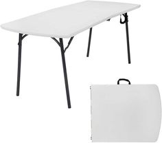 a white table with black legs and a bag on the side, next to it