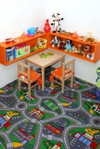 children's playroom with toy cars and toys on the floor