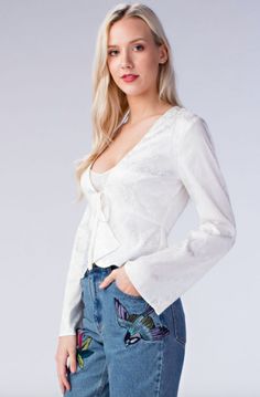 White Satin Bell Sleeve Top Spring Satin Top, Trendy Satin Top For Date Night, Glamorous Satin Tops For Fall, Spring Satin Fitted Blouse, Fitted Satin Blouse For Spring, Fitted Satin Tops For Spring, Satin Tops For Fall Party, Trendy Satin Tops For Fall, Feminine Long Sleeve Satin Tops