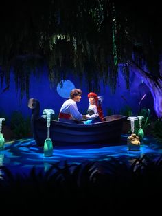 the little mermaid and ariel ride in a boat