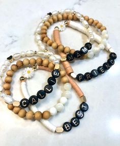 "Adorable mama+mini best friends boho bracelet set with daisy bead. This is a beautiful combination of neutral colors, pearls, gold, and heishi beads. Perfect gift for everyone!  Sizing Recommendation:  I recommend measuring your wrist and ordering 1/2\" larger than your measurement. If ordering as a gift, the most common size is 7\" for adult and 6\" for child." Personalized Bohemian Gold Friendship Bracelets, Bohemian Stackable Beaded Bracelets For Friendship, Adjustable Wooden Beads Bracelet For Everyday, Bohemian Stackable Beaded Bracelets For Everyday, Casual Everyday Jewelry With Wooden Beads, Trendy Round Beads Friendship Bracelets For Mother's Day, Everyday Beaded Bracelets For Mother's Day, Casual Beaded Jewelry For Best Friend Gift, Everyday Wooden Beads Jewelry