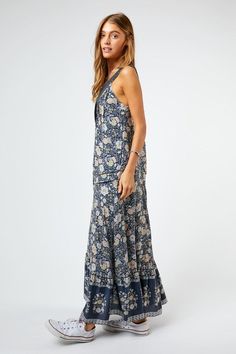 Step away from the same-old and go for something new this season. Show your wild and romantic side in this beautiful floral maxi dress. With a v-neck and button front detail, this dress is easy to wear and has side pockets for a practical edge. The relaxed fit will keep you comfortable during long days and nights. With this sophisticated and timeless piece, your fashion-forward wardrobe will speak volumes. Self: 100% RayonContrast: 80% Cotton, 20% PolyesterLining: 100% Polyester Want to view thi Rachel Clark, New Inventory, Moving On, Sleeveless Maxi Dress, Floral Maxi, Floral Maxi Dress, Floral Print Dress, Timeless Pieces, Something New