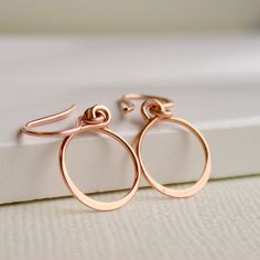 Petite hand formed hoops are absolutely perfect in their petiteness. Earrings measure just 3/4. ROSE GOLD - $20 Simple Rose Gold Hoop Earrings, Simple Design Hoop Earrings For Gift, Simple Design Hoop Earrings As Gift, Dainty Hoop Earrings, Small Rose, Gold Hoops, Minimalist Necklace, Minimalist Earrings, Jewelry Earrings Hoops