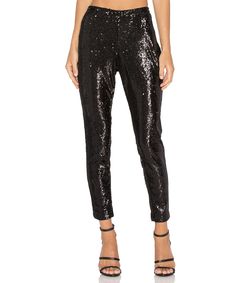 Black Sequin Pants are our must have for the holiday season. Pair these Cupcake and Cashmere favorites with a graphic tank for a perfect going out look.  Poly blend Hand wash cold Elastic waist Sequined throughout Hidden back zipper closure Sequin Joggers, Sequin Jogger Pants, Black Sequin Pants, Sequin Pants, Cupcakes And Cashmere, Elastic Waist Pants, Revolve Clothing, Black Sequins, Price Match