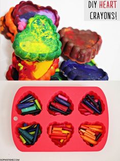 an ice tray with crayons in it next to a plastic molder that is shaped like a heart