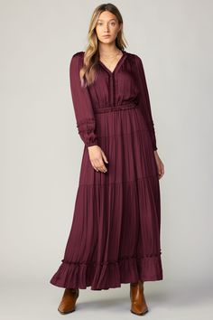 This long-sleeve midi dress is simply captivating with its easy femininity and pretty details. Ruffle trim adds allure, while the cinched waist defines the shape. This stunning piece is sure to become a fast favorite in your wardrobe. •V-neck •Long sleeves •Elasticized waist •Tiered skirt •Ruffle trim DIMENSIONS •Standard: 53" L Item number 2390097 100% Polyester Long Sleeve Maxi Dress Winter, Long Midi Dress Outfits, Winter Maxi Dress, Aesthetic Fall Outfit, Coast Fashion, Midi Dress Outfit, Maxi Dress Winter, Modern Clothes, Midi Dress Fall