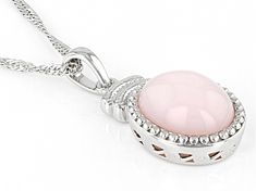 12x10mm Oval Cabochon Pink Opal Rhodium Over Sterling Silver Solitaire Pendant With 18"Singapore Chain. Measures Approximately 1.03"L x 0.50"W. 2.5mm bail. Lobster clasp with 2"extender. White Gold Oval Pendant With Cabochon, Silver Necklace With Cabochon Round Stone, Silver Oval Cabochon Necklace For Anniversary, Pink Cabochon Round Necklace, Pink Round Cabochon Necklace, Conch Pearl, Frame Of Mind, Pendant With Chain, Broken Chain