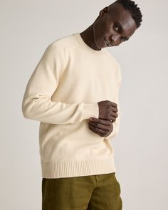 Our 100% Organic Cotton Crewneck Sweater is a classic addition to your everyday rotation. Crafted with care in super-soft organic cotton, this elevated wardrobe essential offers a perfect blend of modern style and timeless design. With a classic fit and ribbed detailing, it's a must-have for your sweater collection.  | Quince | Men's Crewneck Sweater in Alabaster, Size Medium, Organic Cotton Classic Cream Sweater With Ribbed Cuffs, Classic Cream Crew Neck Sweater, Classic Relaxed Fit Winter White Sweater, Classic Cream Sweater For Layering, Winter White Cotton Sweater With Relaxed Fit, Relaxed Fit Cotton Sweater In Winter White, Winter White Cotton Sweater, Relaxed Fit, Classic White Relaxed Fit Sweater, Winter White Relaxed Fit Cotton Sweater