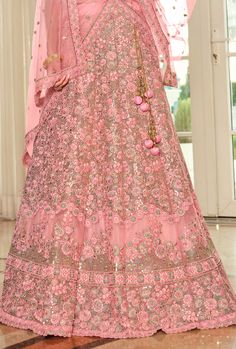 Designer heavy embroidered Bridal Lehenga Choli. Elegant and classic. LEHENGA FABRIC: Net,Handloom Silk Lehenga With Belt BLOUSE FABRIC: Handloom Silk, Net With Inner DUPATTA: Net COLOR: Pink SIZE: upto 42 inches Bust and Waist WORK: Heavy Embroidery Bonus offer - Receive a free mystery gift with your order. Stitching Option - We will email you the measurement guide to confirm your size. SHIPPING: The product will be shipped within 1 - 2 weeks from the date of purchase. Product is returnable if Lehenga With Belt, Classic Lehenga, Blue Bridal Lehenga, Maroon Bridal Lehenga, Pink Lehenga Choli, Grey Lehenga, Embroidered Bridal Lehenga, Pink Bridal Lehenga, Green Lehenga Choli