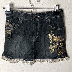 Adorable, Detailed Piece. Features A Ruffled Hem, Small Metal Charms Below The Front Pocket, A Gold “Tattoo-Style” Design With Small Bedazzle Details. Back Pockets Feature A Cool Striped Arched Pattern. “Rocawear” Embroidered Patch Featured On The Back. Mcbling Fashion, Money Clothes, Gold Tattoo, Gold Skirt, Metal Charms, Spend Money, Prime Rib, Pinterest Closet, Dream Style