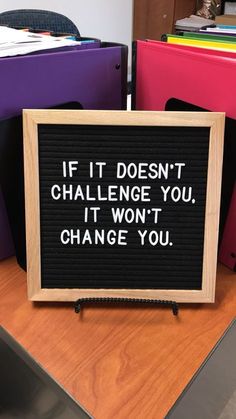 a sign that says if it doesn't challenge you, it won't change you