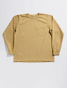 This item is FINAL SALE and not eligible for returns or exchanges. Velva Sheen’s t-shirts have just the right combination of great fit and the perfect palette of colors. This long-sleeved crew neck model has a chest pocket, and is made in a slightly heavier-gauge cotton for a more structured feel and old-school vibe. Compared to their other models, this one has a slightly wider fit in the torso and lower armhole, for a more relaxed overall silhouette. Details and Care: 100% cotton Pigment-dyed. Shorts Sweatpants, Tuxedo Shirts, Perfect Palette, Dyeing Process, Tailored Pants, Tailored Shirts, T-shirt Polos, Shirt Sale, Jacket Sale