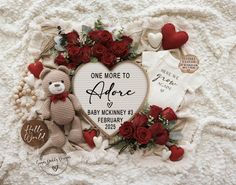 a baby announcement with teddy bears, roses and other items in the shape of a heart