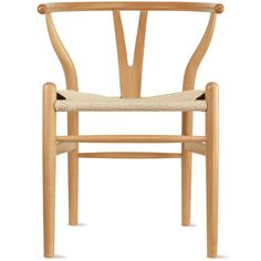 the wish chair is made from natural wood and has an upholstered backrest