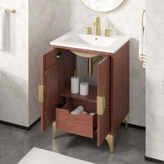 a bathroom with a sink, mirror and towel rack