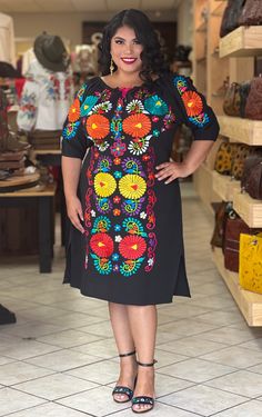 This Beautiful Off the Shoulder Mexican Dress is the perfect Spring & Summer dress. It's lightweight with elastic around the shoulder, made out of cotton and is full of vibrant Colors from top to bottom. This dress has ties on the back in order to adjust the fit. Available size S to 3X The Jewelry modeled may be purchased here: https://www.etsy.com/es/listing/855938626/aretes-mexicanos-de-filigrana-aretes?ref=listings_manager_grid Mexican Dresses For Women Plus Size, Traditional Mexican Outfits For Women, Charro Outfits For Women, Mexican Fiesta Party Outfit, Mexican Outfits For Women, Frida Fashion, Mexican Inspired Dress, Mexican Party Dress, Mexican Fiesta Dresses